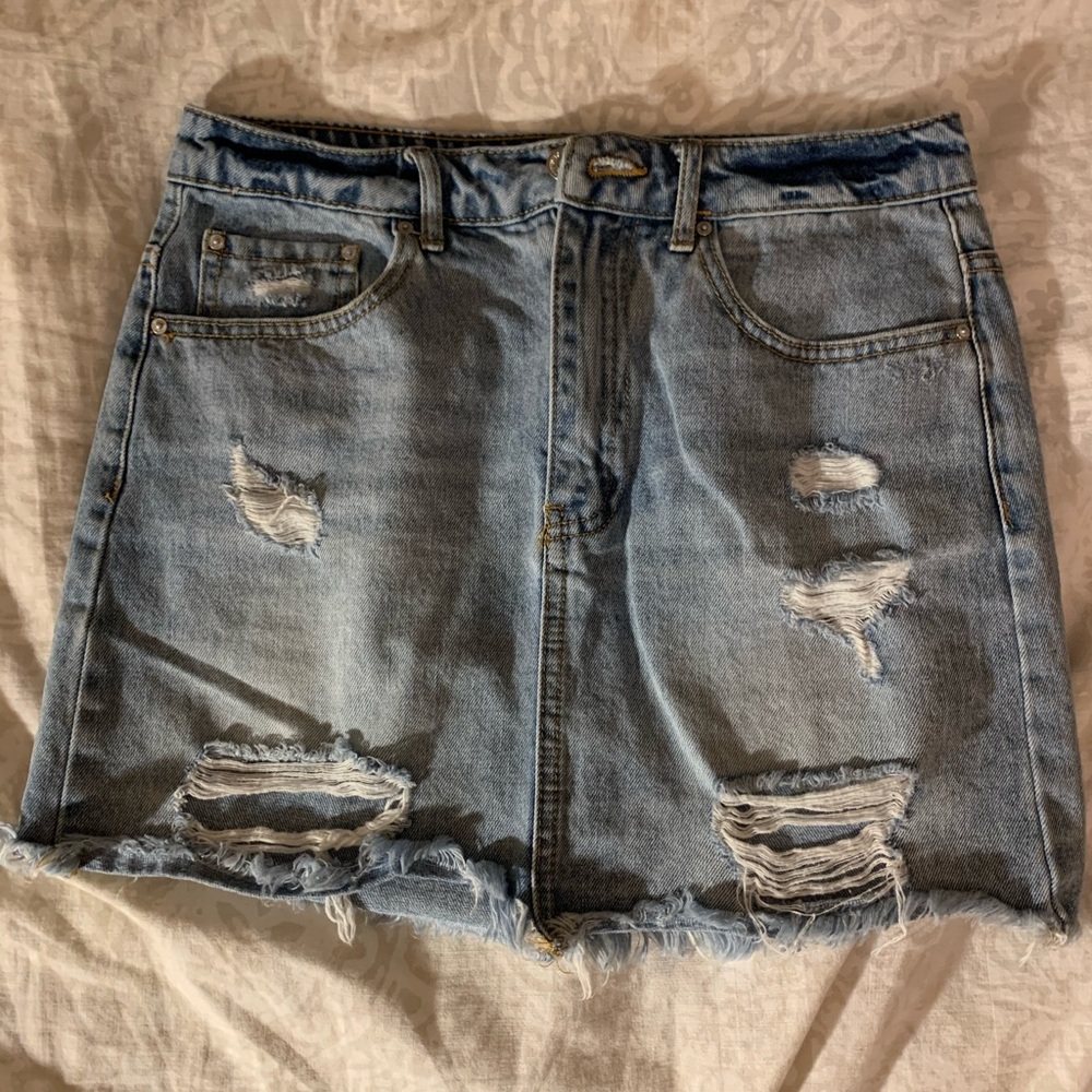 Ripped jean mini skirt